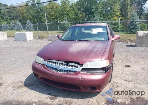 2001 Nissan Altima Gxe z USA, uszkodzony, nr VIN 1N4DL01A21C124146